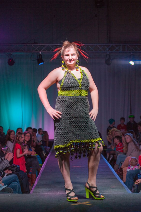 Designer: Ashlie Jackson Materials: vhs tape & discarded cash register tape cores   Quote: “Through the many challenges of the design process I have learned perseverance.”  