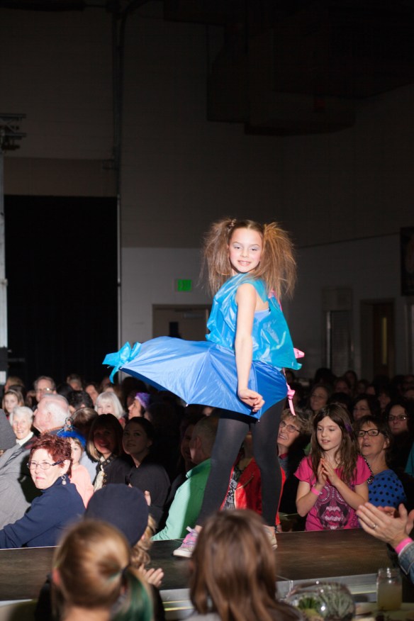 Rain Storm Designer & model: Neve Brandow Material: Umbrella, blastic bags, bottle caps, string, paper & ribbon