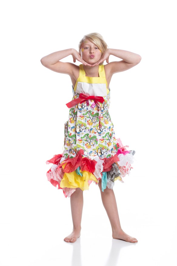 The Unwrapped Dress Designer/Model: Zoie Kuhn Materials: wrapping paper, tissue paper, ribbons, and a garbage bag